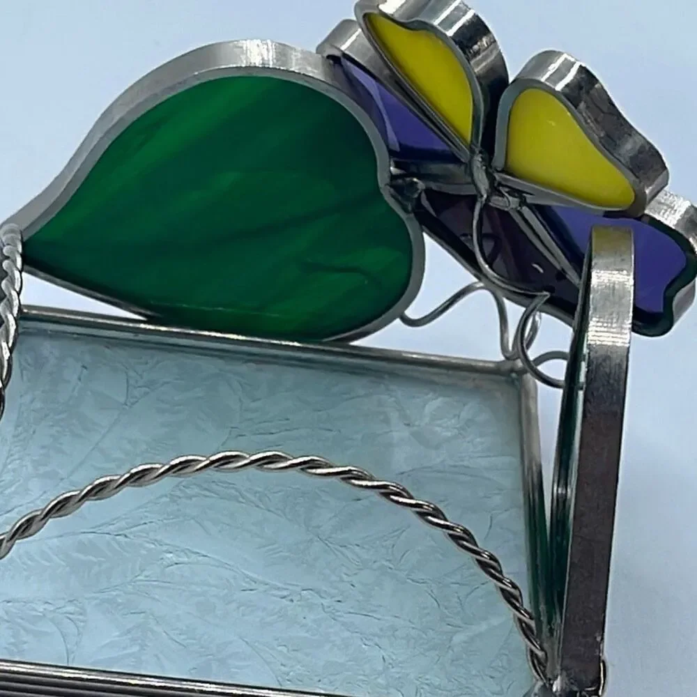 Stained glass leaded framed tea light holder.